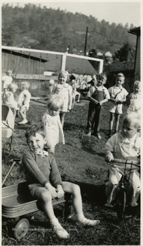 The playground is part of White Day Nursery. All persons are unidentified. 