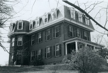 Th house is located on Praire Avenue and Wagner Road. The original owner was Judge Edward C. Bunker. The house was built in the French style in 1860. Information found on page 88 in "The influences of Nineteenth Century Architectural Styles on Morgantown Homes" by Clyda Paire Petitte. It is Figure 65 in the book.