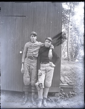 Left, Arthur Hinton, other player not identified.