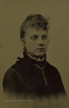 Large tintype image of a young woman named Rosa.