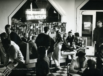 Students gathered inside Giovanni's Pizza Shop.