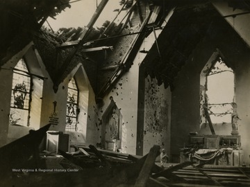 Information on back of photo reads: "Debris litters the interior of a ruined church in Germany, one of the many buildings destroyed during the bitter fighting which marked the Allied thrust into the Reich."