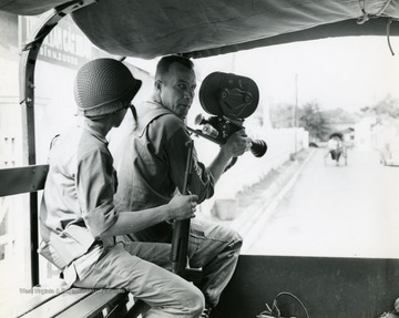 Raymond Young served in Europe during WWII as a combat photographer and in South Vietnam as a medical photographer.