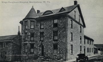 Building was originally established as a second prison in 1797 for the Martinsburg area. In 1890 a group of women from Sisters of the Holy Spirit came to the area to bring nursing care to the inmates of the prison. In 1893 the group, known as the King's Daughter's, bought the building and after remodeling, a new hospital was opened on May 15, 1896. In 1914 a training school for nurses was opened in the same building, graduating 44 nurses before closing in 1973. See original for correspondence. (From postcard collection legacy system.)