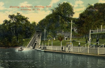 People watch riders travel down the flume ride attraction at Wheeling Park. Published by Olmstead Brothers Company. (From postcard collection legacy system.)