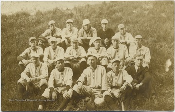 First row: Bill Scherr, Davis, Arlett Hartman, Wayne Paker, Red Sturges.  Second row: Chadwick, Irwin Stone, Guy Jamison, Bill Madera, Hersey Eckert, Eldon Tucker.  Third row: Maderia, Frank Stubbs, Hall, Thomas, and unidentified.