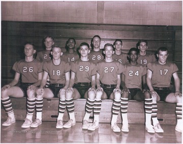 Team portrait in the school gymnasium. 