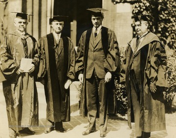 Print number 384a. From left to right: President J.R. Turner, (unidentified), (unidentified), Governor H.M. Gore.