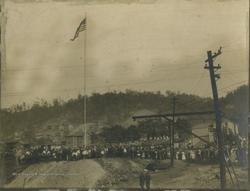 A large crowd gathers for the event.