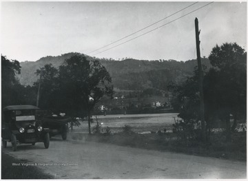 Judge Miller's home in the background. View from the Avis side of Greenbrier River on Foss Bridge. 