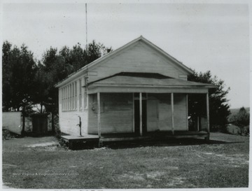 View looking at the building exterior from across the lawn. 