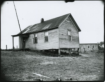 Photo of the one room school building's exterior. 