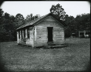 Exterior of the building sporting the American flag at its entrance. 