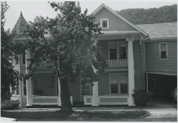 Exterior of the house located on Block D #12. The columns were brought by horse and buggy from Princeton, W. Va.