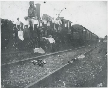 Murrell and Faulkner family pictured on the engine. 