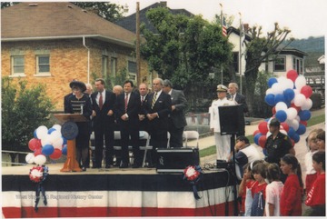 Ceremony converting the Carnegie Library to the museum. Subjects unidentified. 