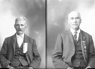 Man on right wears a ribbon that says "Hoffman Post No. 62 C.A.R. Morgantown, W. Va.". Man on left wears a ribbon that says "Preston County Soldiers' Reunion July 2, 3, and 4 Kingwood, W. Va.".