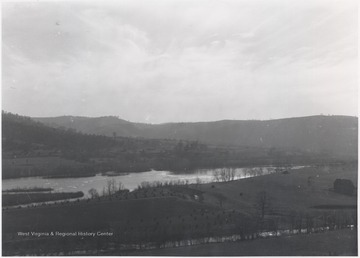 The river cuts through the valley as it heads toward the creek. 