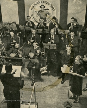 Caption with photograph reads: "The show goes on the air. Variety calls it "the capitalistic Pins and Needles" after the Broadway show of the Ladies Garment Workers' Union (LIFE, Dec. 27). Steelworkers seem to enjoy this company show as much as the garment workers enjoy their union show."