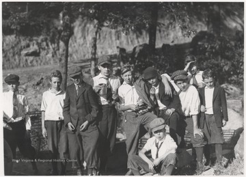 Ten unidentified boys pose for a group picture. 