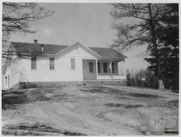 Looking up at the small schoolhouse from across the lawn. 