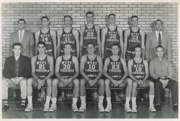 Sitting, from left to right, is Manager Ronald Lewellen, Jerry Turner, Butch Goode, Jim Reiss, Jim Warren, Jay Jacobs, and Manager Jim Cook.Standing, from left to right, is Assistant Coach Jim Sottile, Jerry West, Jim Ritchie, Joe Posch, Pat Duffy, Willie Akers, and Coach Quentin Barnette. 