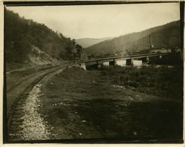 This image is part of the Thompson Family of Canaan Valley Collection. The Thompson family played a large role in the timber industry of Tucker County during the 1800s, and later prospered in the region as farmers, business owners, and prominent members of the Canaan Valley community.Scenic view of the Keyser Curve along the Western Maryland Railroad.