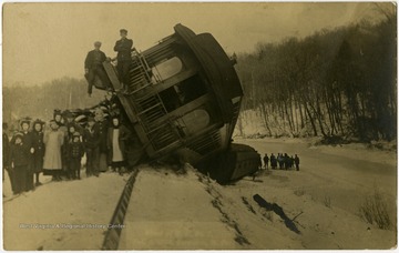 The back of the postcard reads, "Miners arrested."This image is part of the Thompson Family of Canaan Valley Collection. The Thompson family played a large role int he timber industry of Tucker County during the 1800s, and later prospered in the region as farmers, business owners, and prominent members of the Canaan Valley community. 