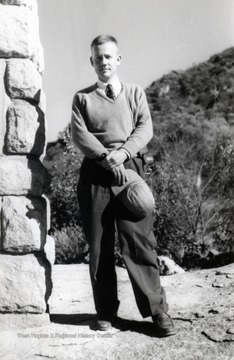 Edward C. Tabler standing beside the Pioneer Monument in Zimbabwe, Africa.  