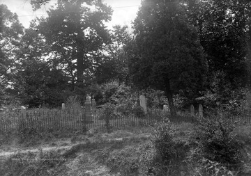 Tombstones are scattered across the designated grave site. 