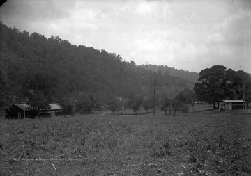 In view are some small shops and an old mess hall.