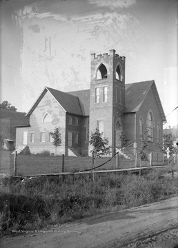 A view of a church building from across the road.