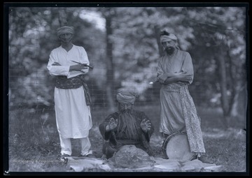 Three men are disguised as foreign characters. 