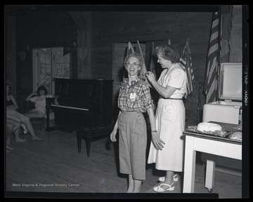 The two unidentified women pal around during the class. 