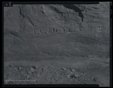 Photo of Native American inscriptions inside of a cave. 