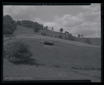 View of a cave from the outside which holds Native American cave writings. 