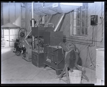 An interior look inside the cottage which holds the electrical apparatus machinery. 