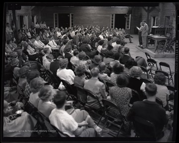 Two speakers address members of the Rural Youth of USA. Subjects unidentified. 