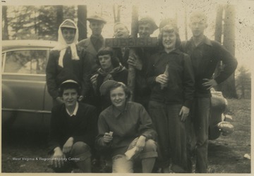 Back of the photograph reads, "the Gang." 