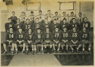 In the first row, from left to right, is: Ronald Everly; Charles Glotfelty; Frank Lambert; Richard Fraley; Jim Freeland; Logan Browning; Louis Kelly, Don Groves; Eugene Auman.In the second row, from left to right, is: Lawrence Smith; Bill McCarty; David Metheny; Paul Cooper; Arthur Sisler; Jack Hill; Clifford Lambert; Charles Pilchard; Paul Lewis.In the third row, from left to right, is: Robert Feather (manager); Max Messenger; Robert Brittner; Jim Pifer; Dick Colins; Jim Breeden; Jim Calvert; Ben Brown; Coach Fred C. Carrol.