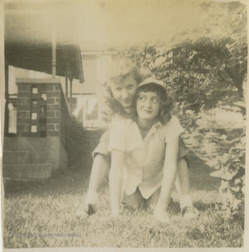 Terra Alta High School students Josephine Kisner (bottom) and Josephine Davis (top) pal around.