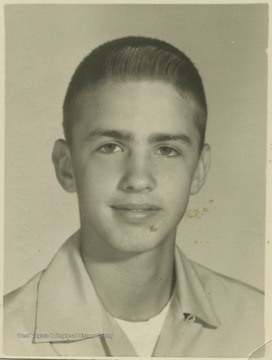 Sharpless, a student at Southern Garrett High School, poses for his school photo. 