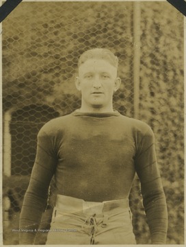 Portrait of Mountaineer halfback Andrew V. 'Rip' King ('19) in his football gear. 