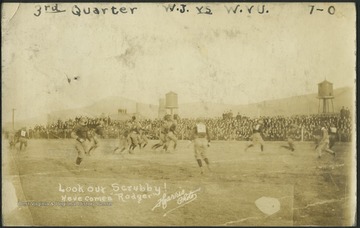 Inscription on the photo reads, "Look out, Scrubby! Here comes Rodger," likely referring to fullback and captain-elect Errett Rodgers ('19). West Virginia University beat Washington & Jefferson 7-0.