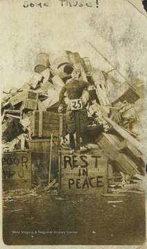 A scarecrow depicting a W. & J. football player is placed above a sign that reads, "Rest in Peace," after WVU defeated the team 7-0.