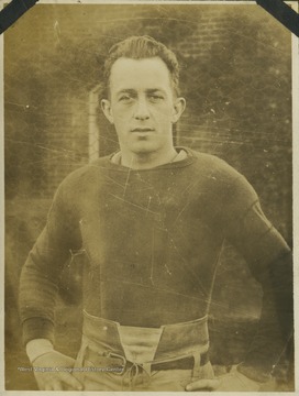 A West Virginia University football player identified as "Chenny" is pictured in his practice gear. 