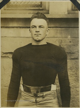 An unidentified West Virginia University football player is pictured in his practice gear. 