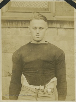 An unidentified West Virginia University football player is pictured in his practice gear. 