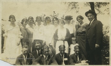 The McMillan family gathers for a family photo. 