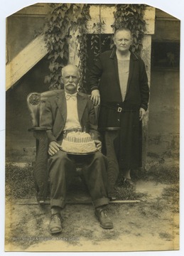 Leander Sylvanious Smith and Niranda Elizabeth Hamilton Smith are pictured on their 50th wedding anniversary. They are the parents of Ora Mae Smith Stephens, who married Leaman Clark Stephens and mothered Eschol Lee Stephens. 